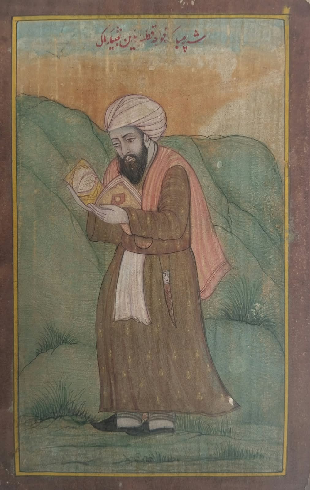 Mughal Miniature painting of sufi saint holding a book